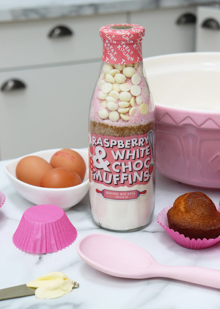 Raspberry and white chocolate muffins baking bottle